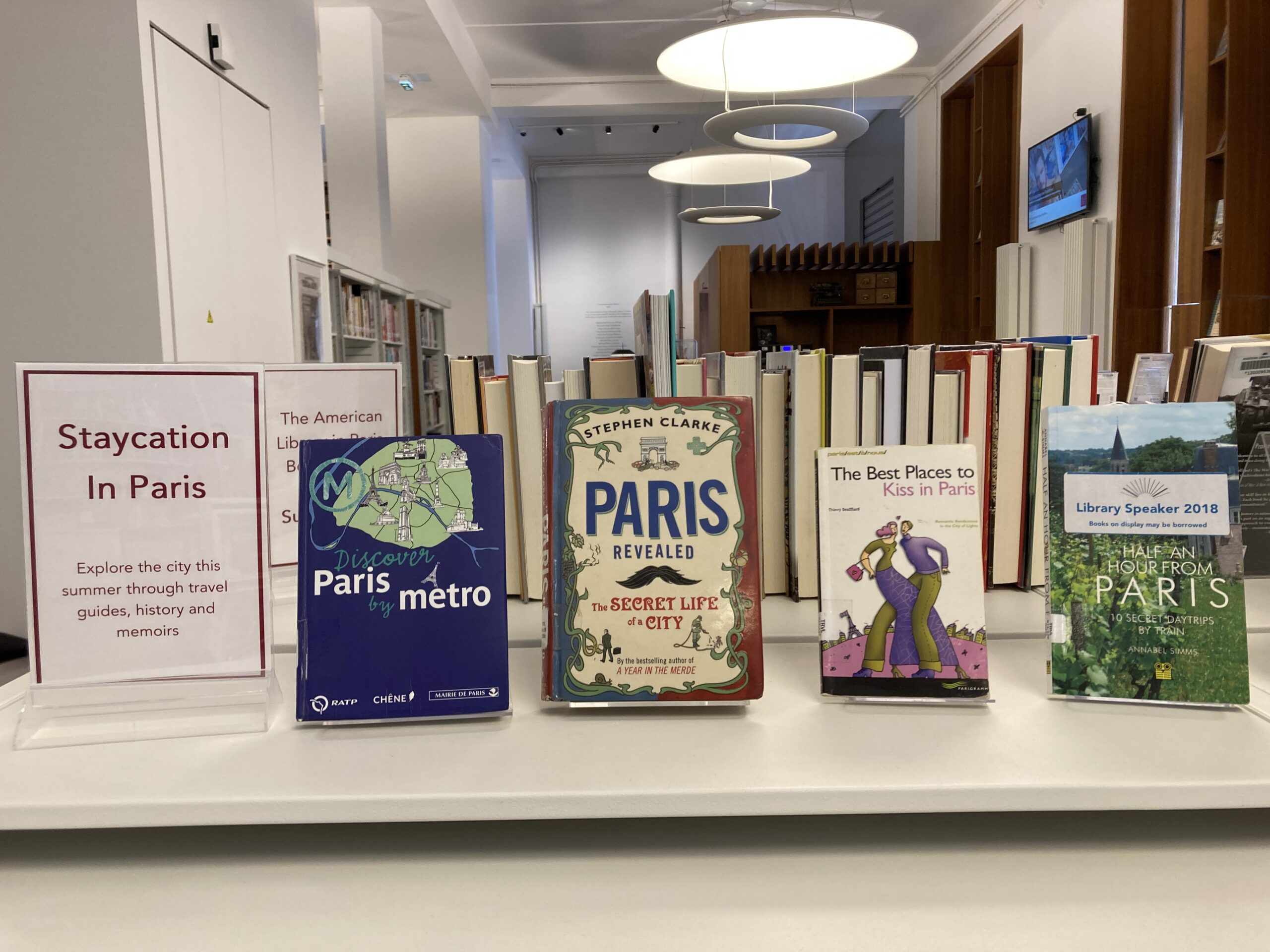 Display of books staycation in Paris travelguide
